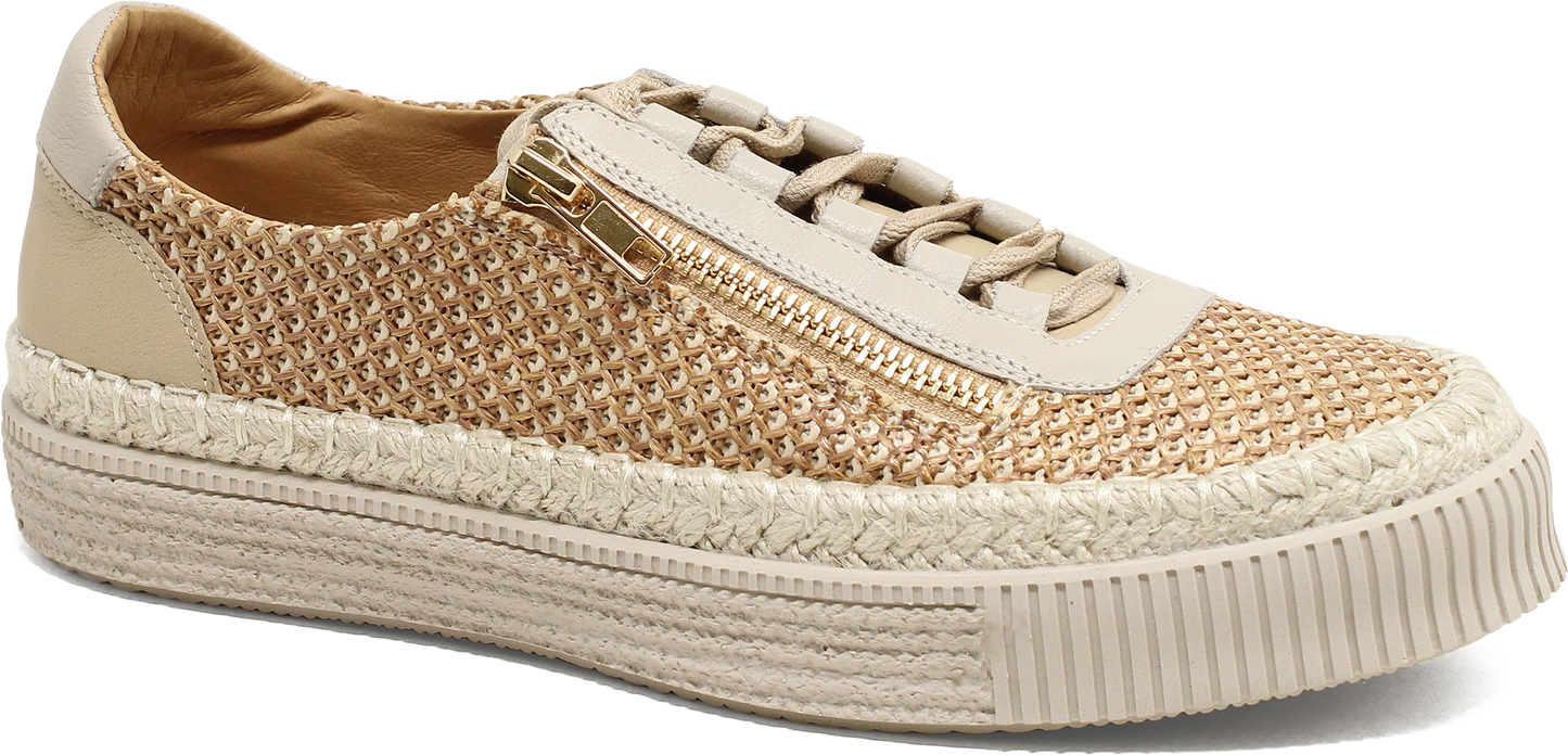 Beige sneaker with textured pattern on a white background