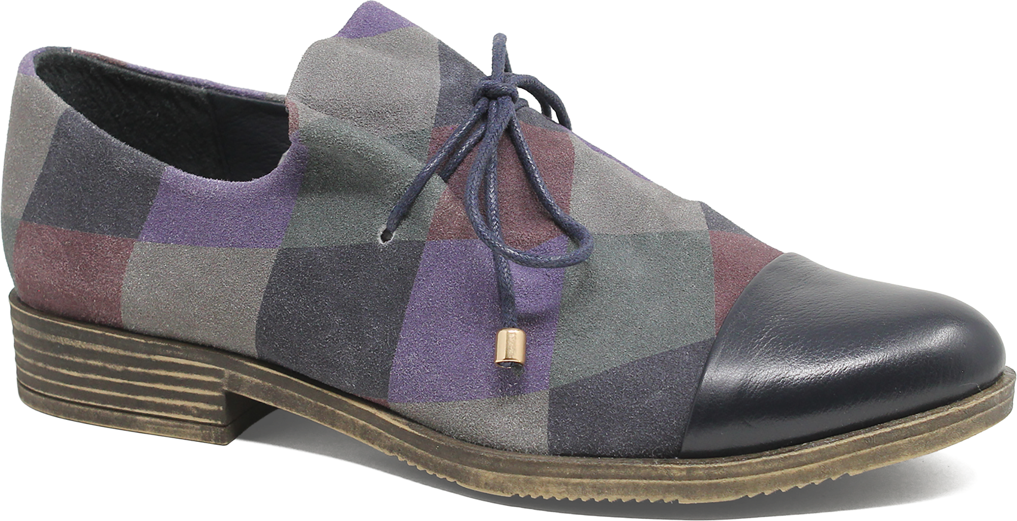 Multicolored checkered shoe with a black toe cap on a white background