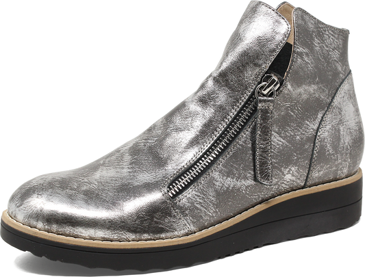 Silver metallic ankle boot with a zipper on a white background