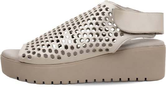 Beige perforated sandal on a white background