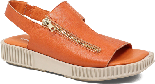 Orange sandal with a gold zipper on a white background